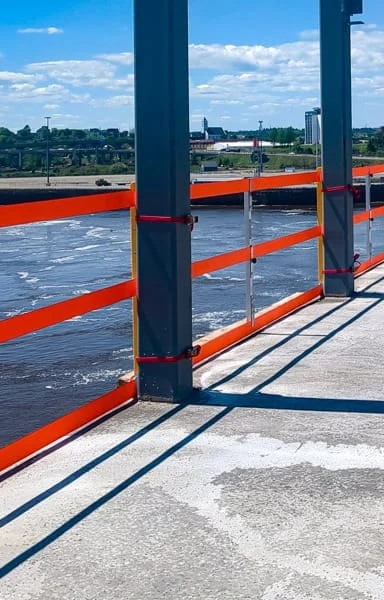 StrapRail floats above the deck for easy concrete finishing.